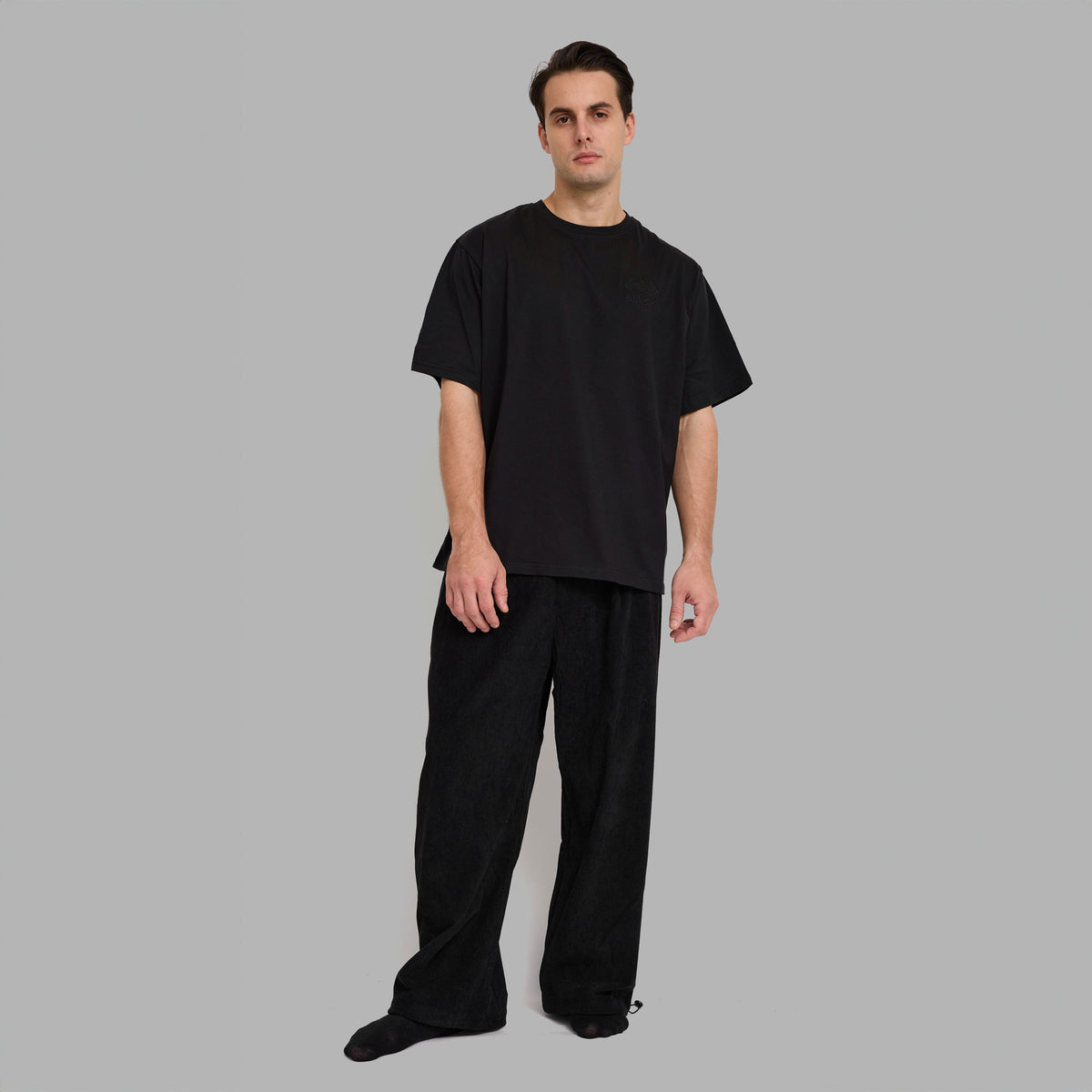 Pantalon noir en velours côtelé 