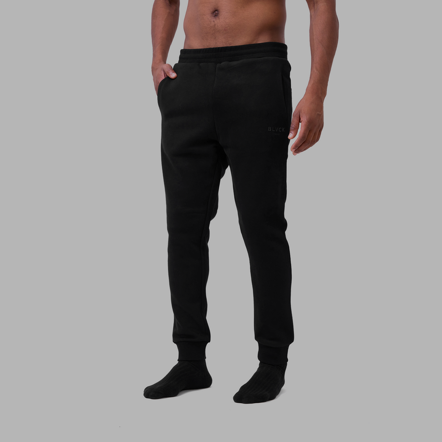 Sweat Pants in Black, Baserange, Covet + Lou