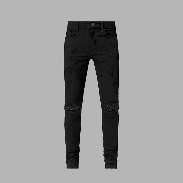 Jean noir déchiré avec monogrammes Blvck