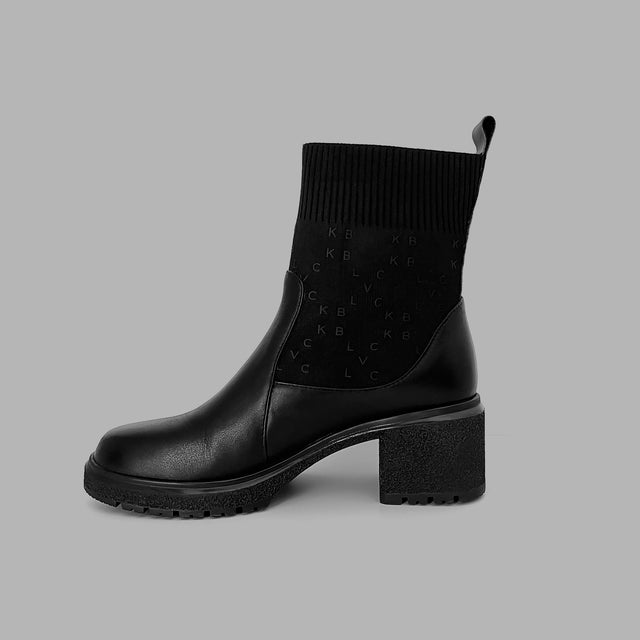 Bottines noires avec monogrammes