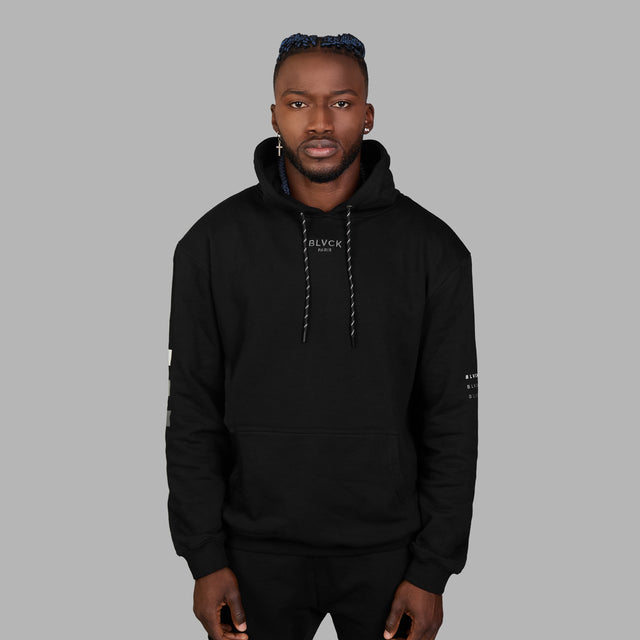 Sweatshirt à capuche noir avec imprimé de crâne