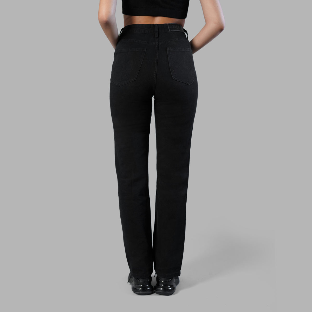 Jean noir déchiré avec monogrammes Blvck