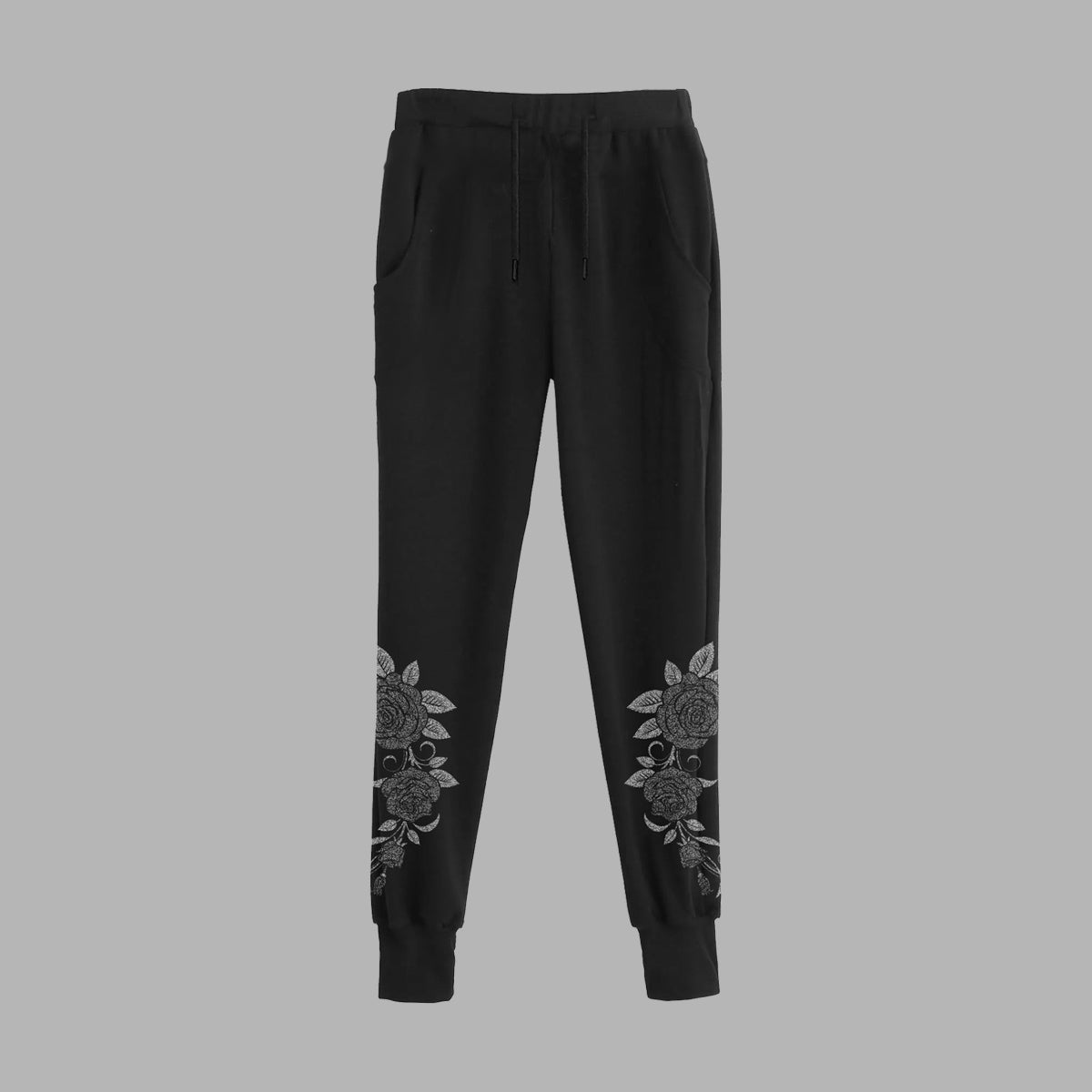 Pantalon de survêtement noir avec illustration de roses